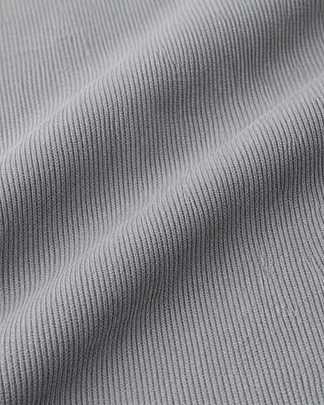 Soft gray ribbed cotton fabric for men's everyday innerwear, showcasing comfort and clean fit texture.